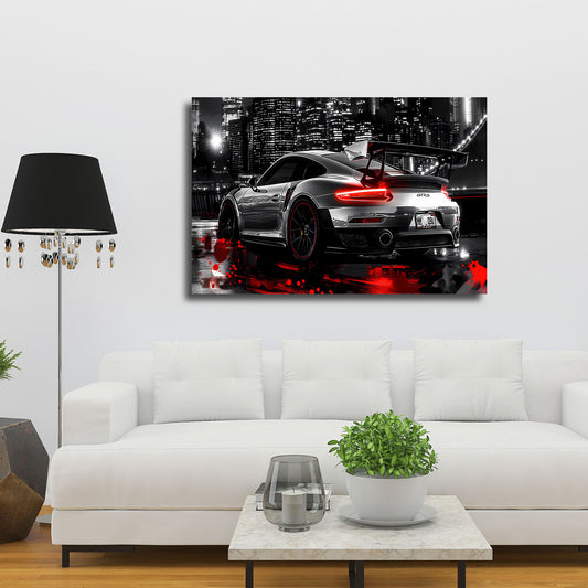 Auto sportivo in corsa notturna con skyline quadro