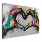 Mani graffiti creano un cuore ricco di colori quadro