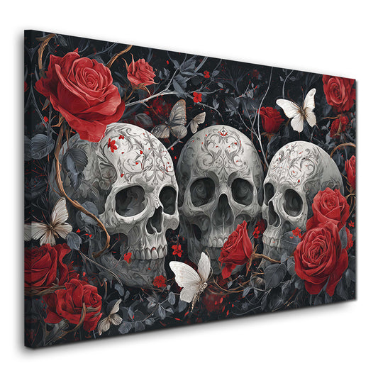 Tre teschi ornati con rose rosse e farfalle stile gotico quadro
